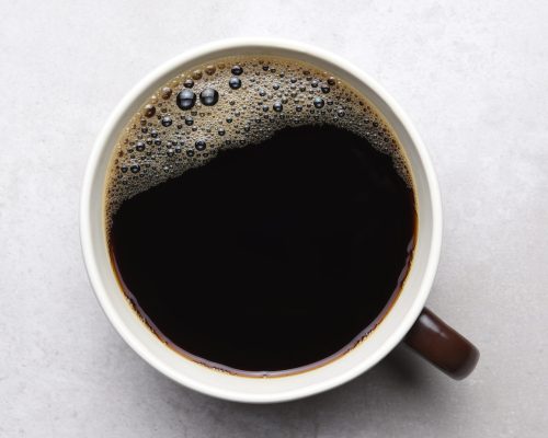 black-coffee-in-brown-mug-on-light-gray-tile-2025-10-16-06-38-15-utc (1)